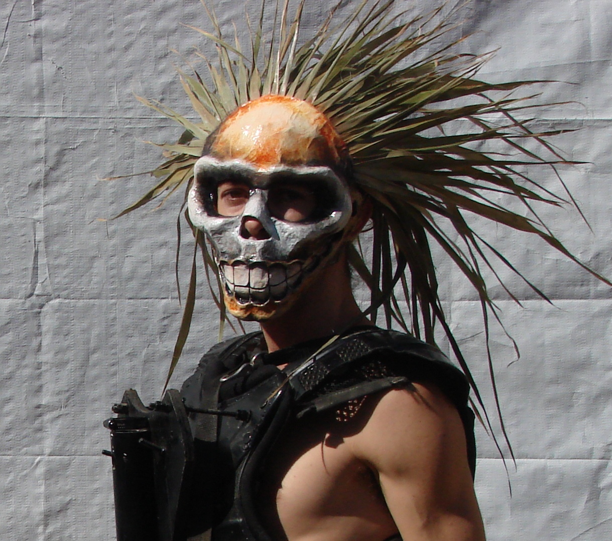 Wearable skull mask with a long natural headdress